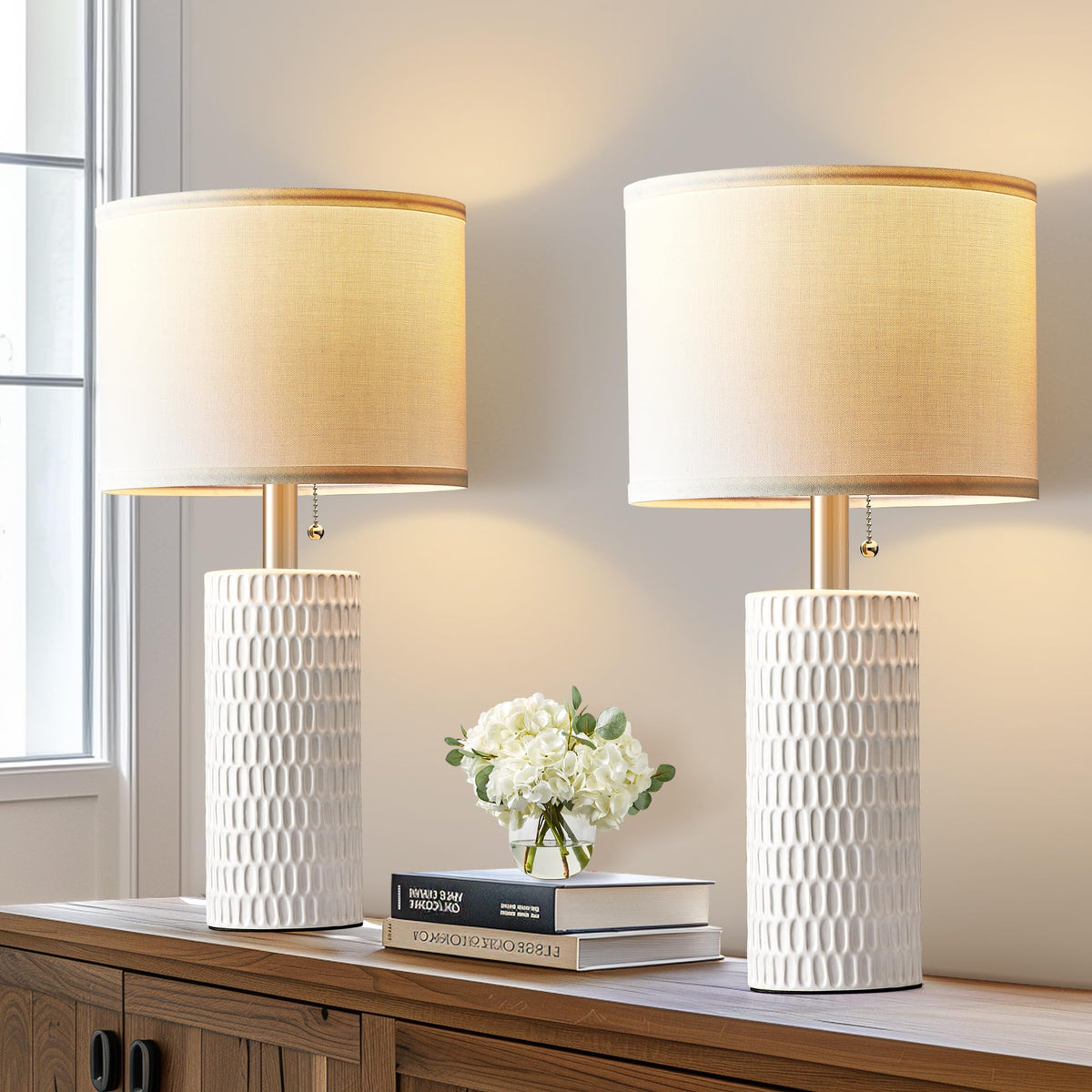 Reaketon lamp pair shows shade texture for warm ambience.
