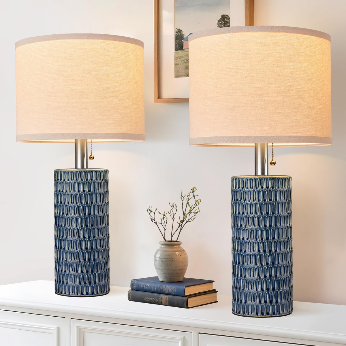 Reaketon duo table lamps on a bedside table for ambient lighting.