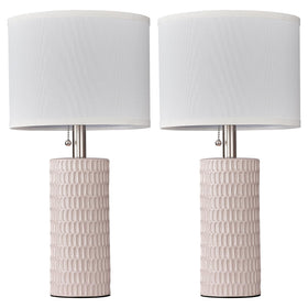 Reaketon pink lampshade diffuses light for relaxing nighttime reading.