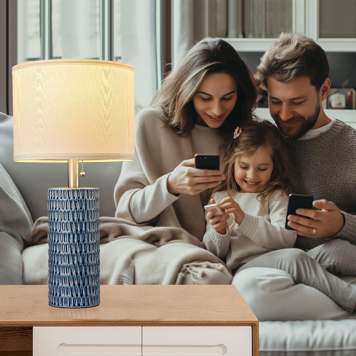 Reaketon dark blue fabric shade producing warm, soft light.