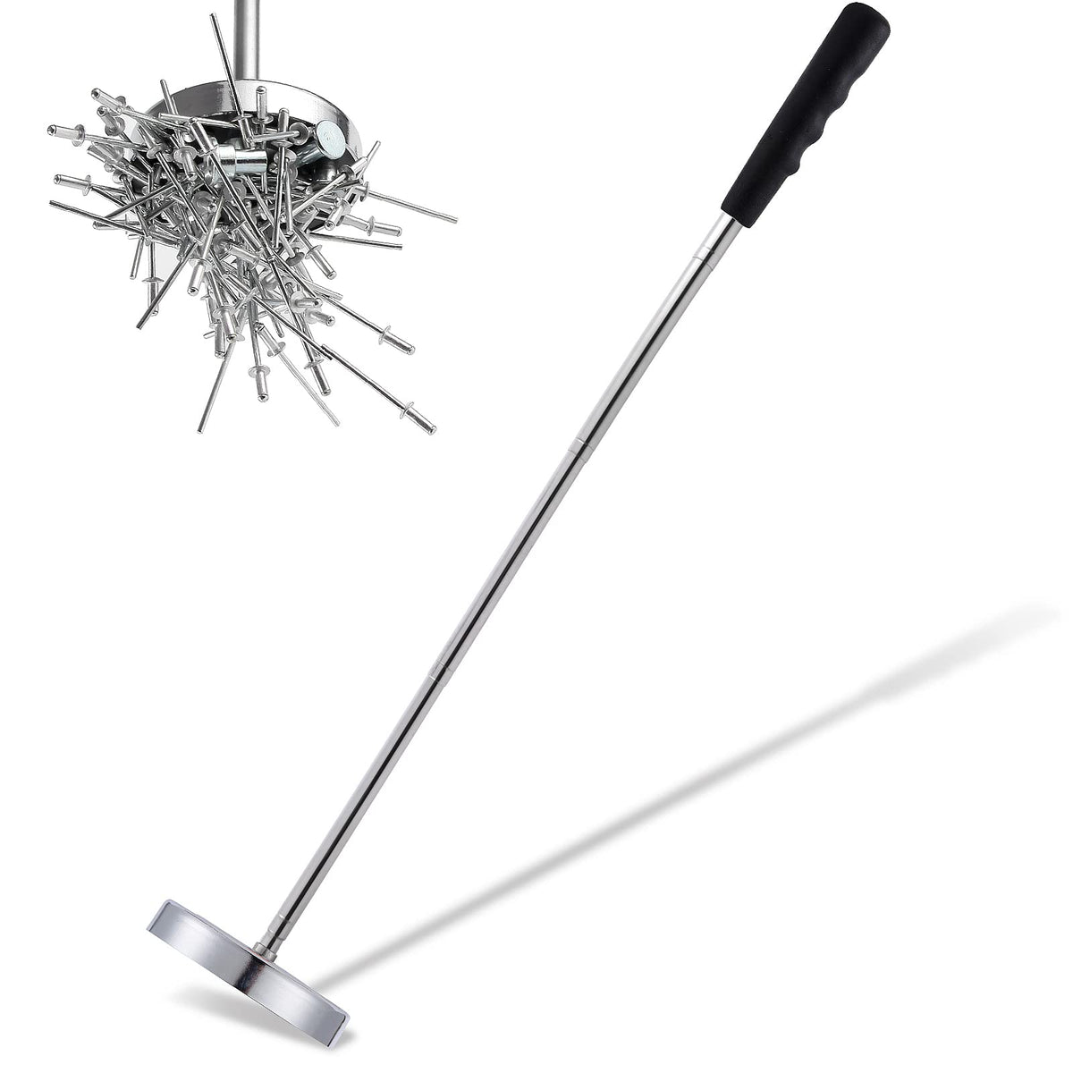 Rechabite magnetic sweeper catching nails and screws for quick floor cleanup.
