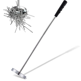 Rechabite magnetic sweeper catching nails and screws for quick floor cleanup.