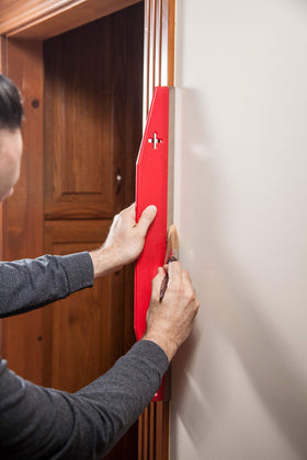 Red Devil 4047 trim edger smooths edges for precise work.