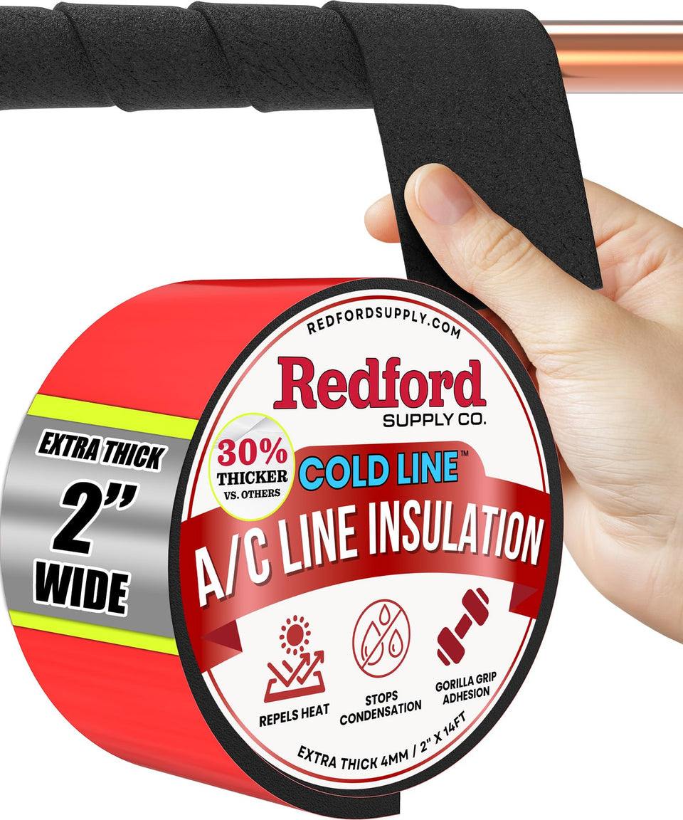 Redford Supply Co AC line insulation wrap applied to an outdoor pipe for frost protection