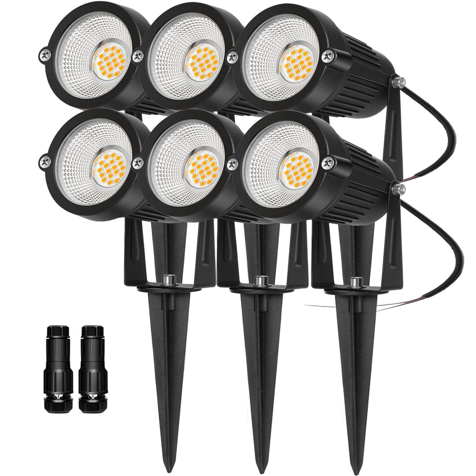 REEGOLD low-voltage landscape light on pathway for enhanced safety and ambiance.