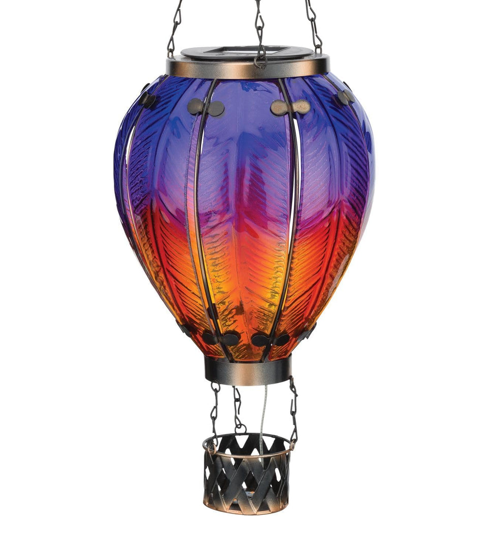 Regal Art and Gift hot air balloon lantern purple 23.5 inch glows softly outdoors