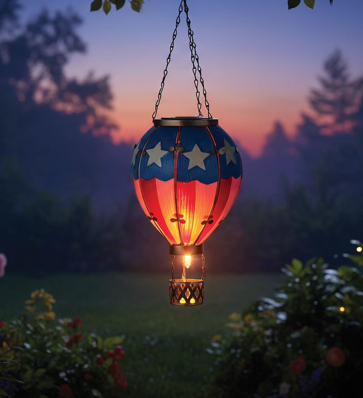 Regal Art & Gift garden display lantern adds whimsy to outdoor spaces.
