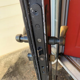 ReigaHood spring-loaded tabs assist quick mortise lock removal.