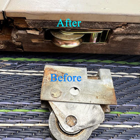 ReigaHood stainless housing close-up highlighting corrosion resistance for outdoor doors.