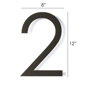 REINCARVATION black-coated metal house number close-up showing rust-resistant finish