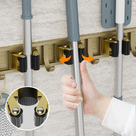 Reliahom bronze hooks in use for tool organization in garage or laundry room.