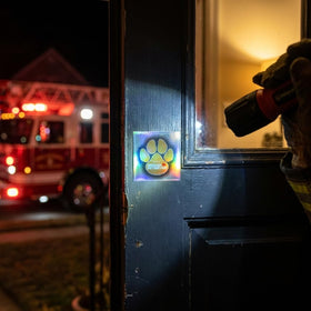 Rescue Retriever fire-responder beacon visible through smoke for locating pets.