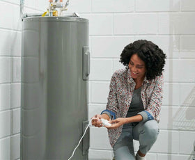 RESIDEO CHW3610W8001 5ft sensor cable extending leak coverage throughout a basement.