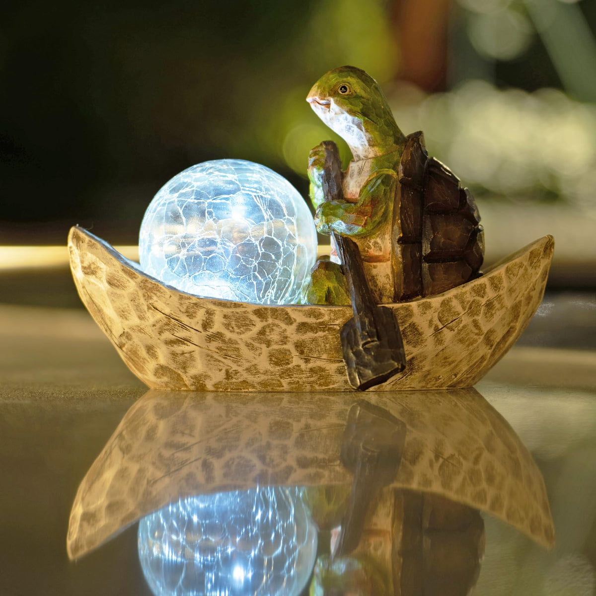 Rezpuao garden turtle statue, front view, adds cheerful charm to outdoor spaces.