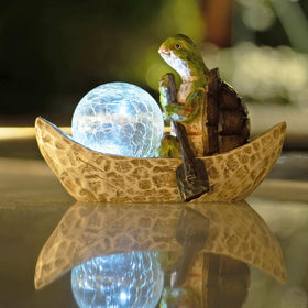 Rezpuao garden turtle statue, front view, adds cheerful charm to outdoor spaces.