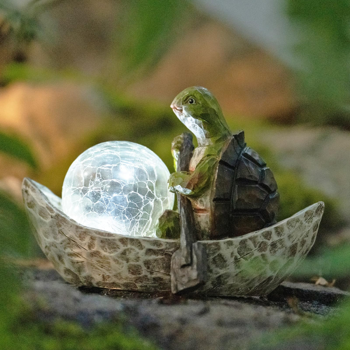 Rezpuao solar-lit turtle sculpture creates ambient backyard lighting.