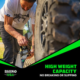 In use on a truck bed showing secure cargo with Rhino USA straps