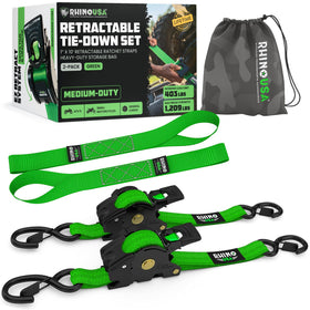 Rhino USA retractable ratchet strap extended for secure cargo on a truck bed