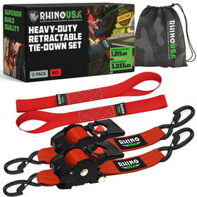 Rhino USA retractable strap in red, 2in x 10ft, ideal for securing cargo on trucks.