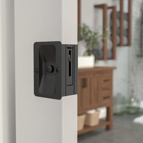 Onward pocket door pull privacy lock close-up showing secure privacy option.