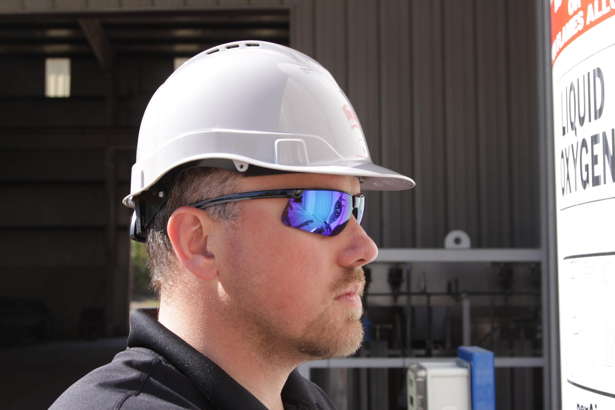 Ridgeline Pyramex cap-style hard hat triangle knob adjusts suspension from 6.5 to 8 inches.