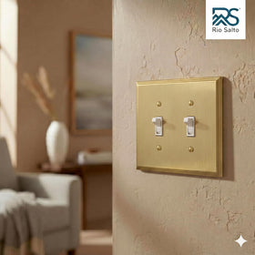 Rio Salto brass double-toggle wall plate close-up, highlighting the durable brushed finish.