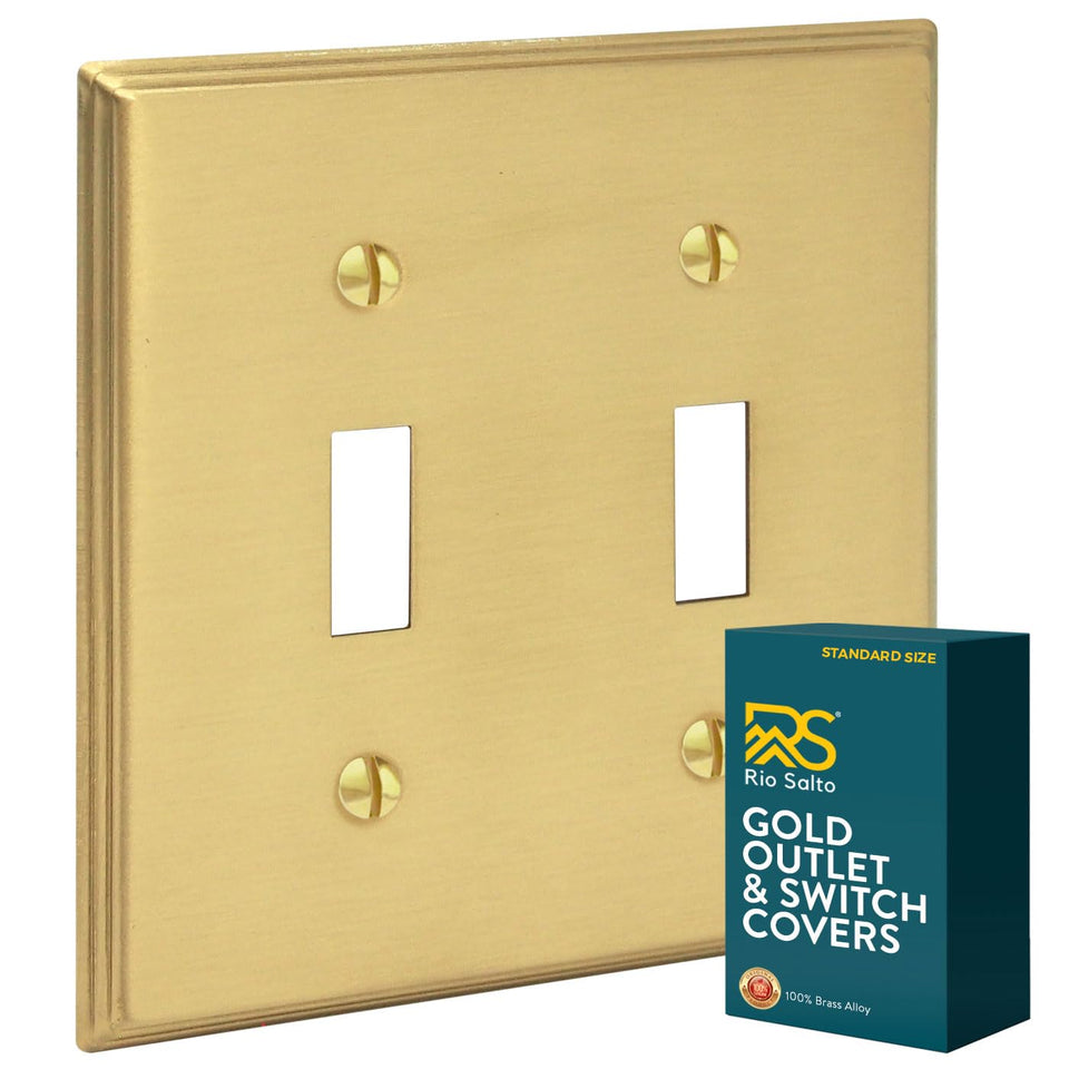 Rio Salto brass double-toggle wall plate, front view, enhances room aesthetics with a refined brushed gold finish.
