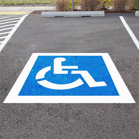 RoadAlchemist handicap stencil on asphalt shows a clear 36x36 symbol for accessible parking.