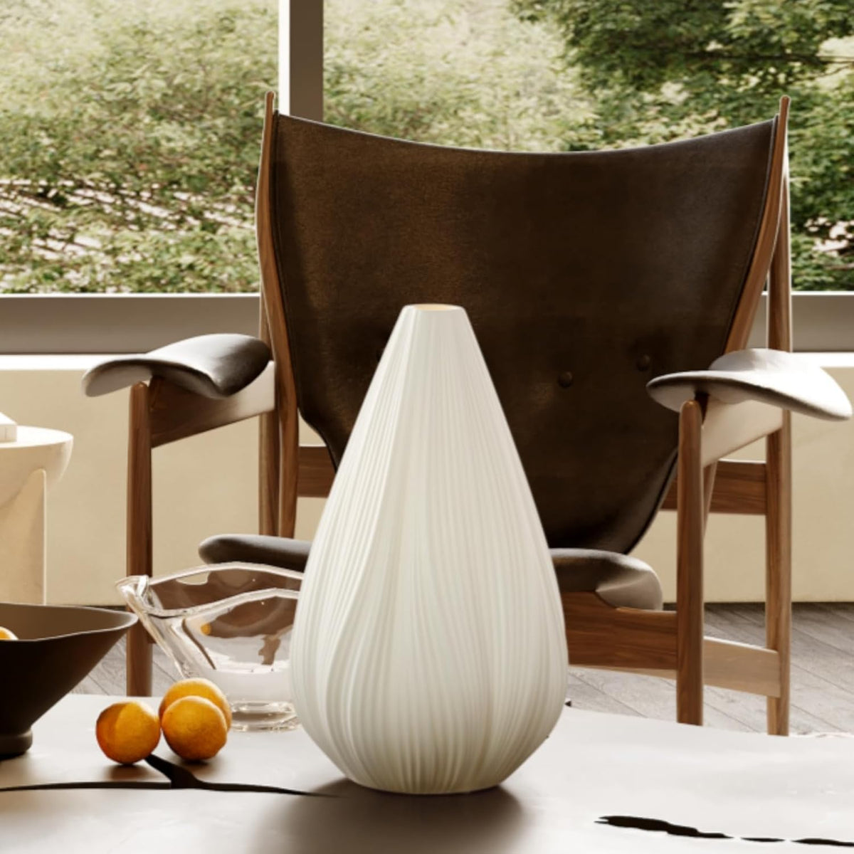 RONDURE end-table accent light adds mood to seating areas.