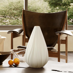 RONDURE end-table accent light adds mood to seating areas.