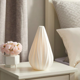 RONDURE minimalist ceramic design brings subtle character to decor.