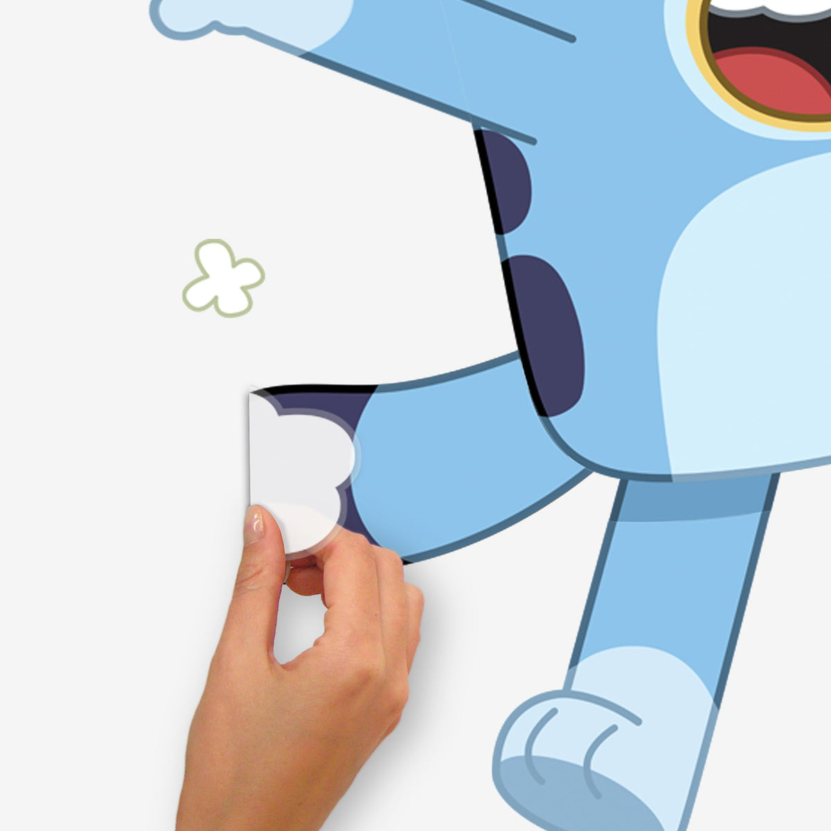 RoomMates Bluey removable decal demonstrates residue-free repositioning on walls.