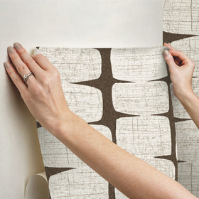 RoomMates RMK12349PL beads wallpaper accent wall shot featuring retro bead motif.