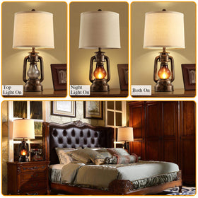 RORIANO smoky-gray glass lantern emits a soft, diffused night light