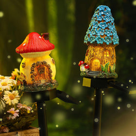 Rossesay Fairy House Mushroom Solar Light enhances patio or walkway spaces.
