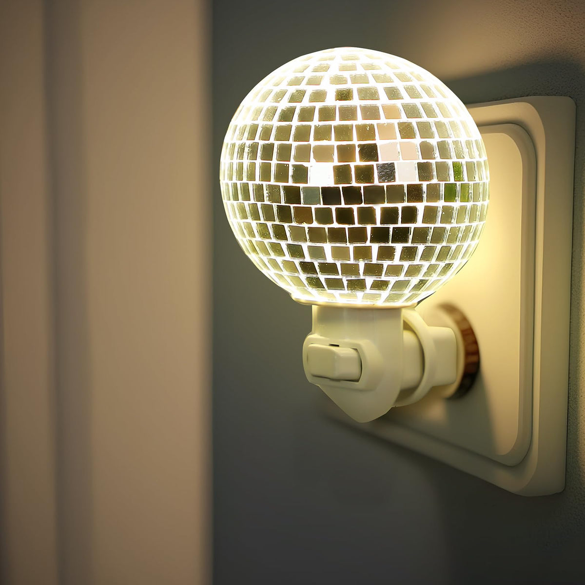 Rossesay silver mirror ball lamp creates retro sparkle for small spaces