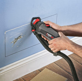 RotoZip ZB16 bit in use enabling fast drywall cut-outs during remodeling.