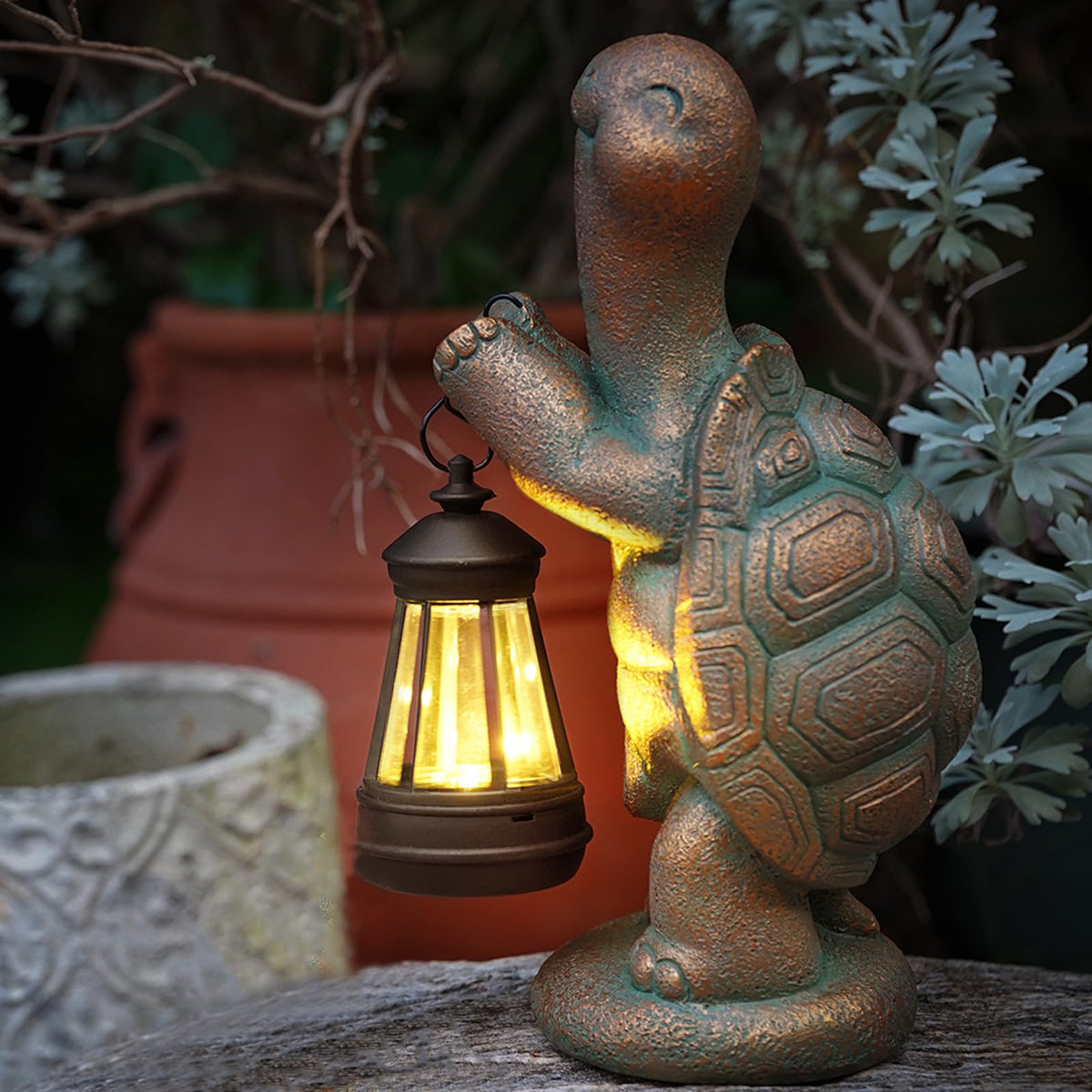 Roundot decorative turtle statue with LED light enhances entryway appeal.