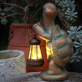 Roundot decorative turtle statue with LED light enhances entryway appeal.