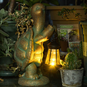 Roundot resin turtle lantern decor for safe, decorative outdoor lighting.