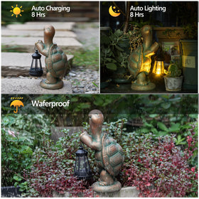 Roundot turtle statue sits beside flowers, casting gentle light after sunset.