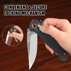 RoverTac knife showing lanyard hole and backpack attachment option