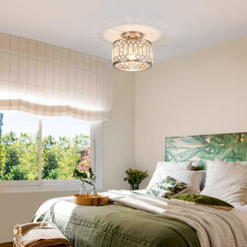 Rpzloila nine-inch-diameter flush mount fits low ceilings neatly