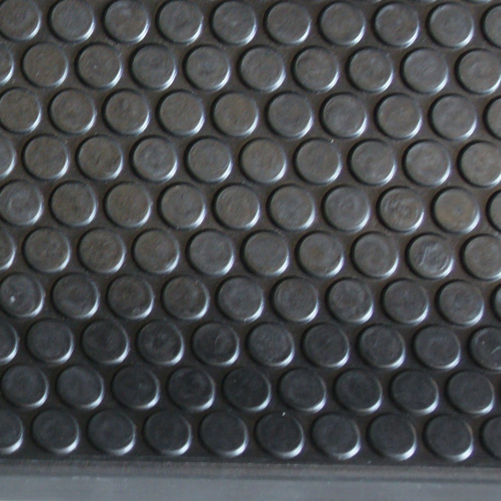 Six-pack Rubber-Cal Coin-Grip mats laid across a staircase