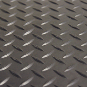 Diamond-Plate flooring roll demonstrates protective surface for floors and equipment.