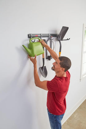 Rubbermaid FastTrack garage scene showing organized gear and floor space