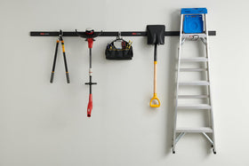 Rubbermaid FastTrack utility hook supporting cords and bags at hand