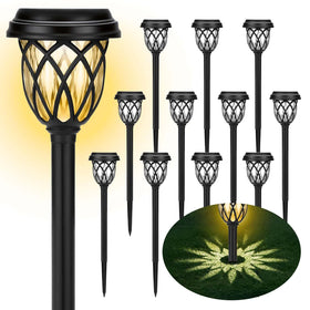 Ruhotili solar path lights illuminate garden walkways with a warm glow.