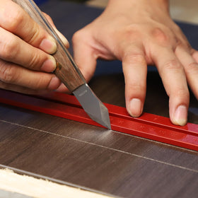 RUITOOL marking knife with dual grooves for left- or right-handed use.