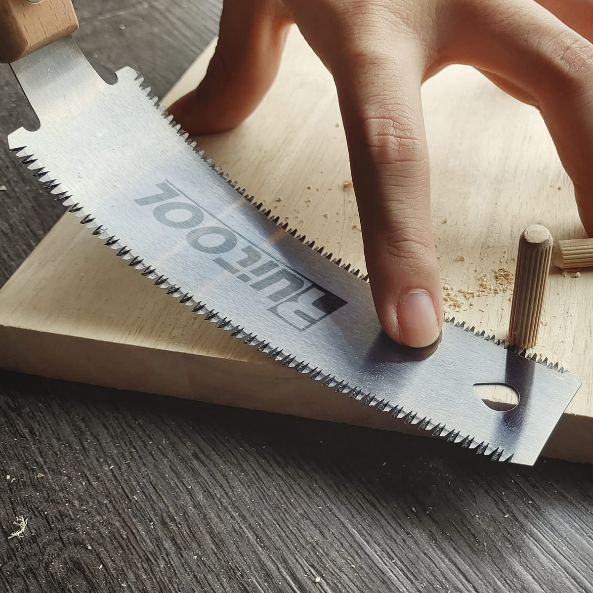 RUITOOL pull saw in action for woodworking projects and finishes.